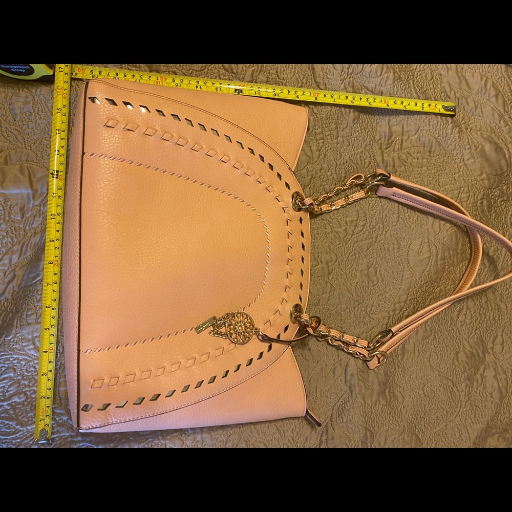 Jessica Simpson handbag color is a peach